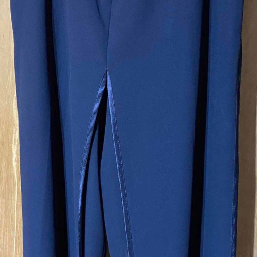 Navy blue maxi dress pants with slit and zipper back. Size: 14
